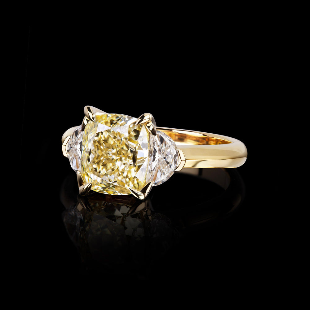 Trilogy 3.02ct Fancy Yellow cushion cut diamond ring with half moon cut diamonds in yellow gold by Stefano Canturi