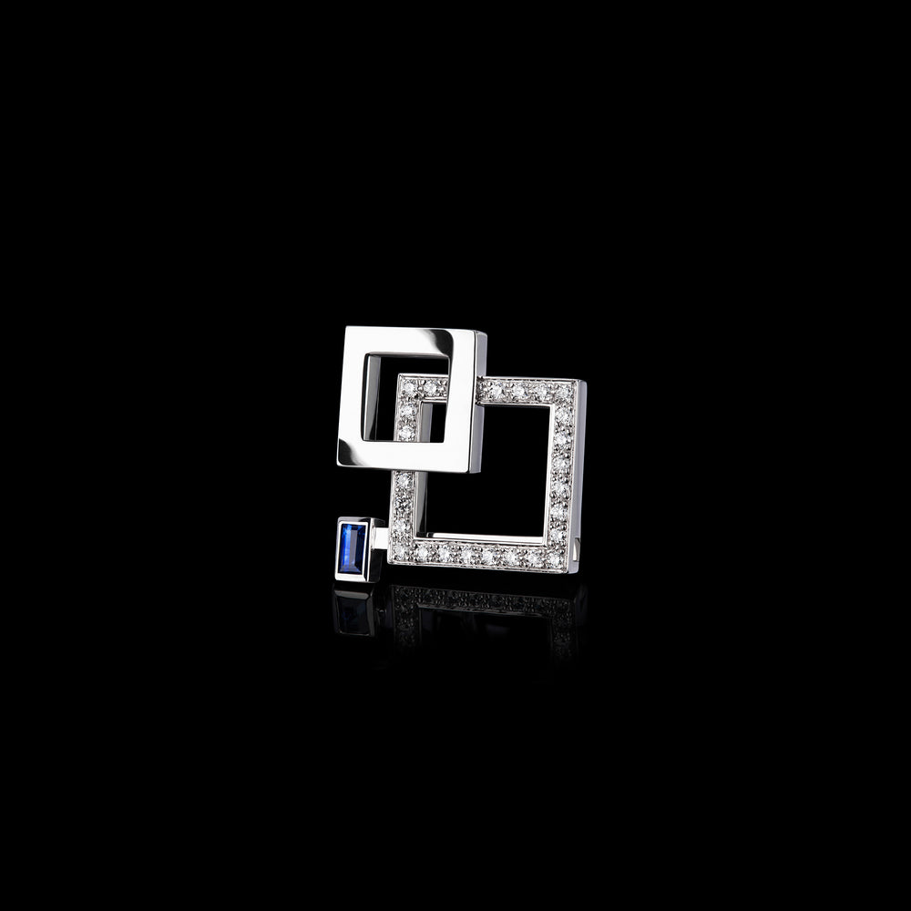 Geometric brooch natural diamonds with blue sapphire baguette clasp set in white gold by Stefano Canturi