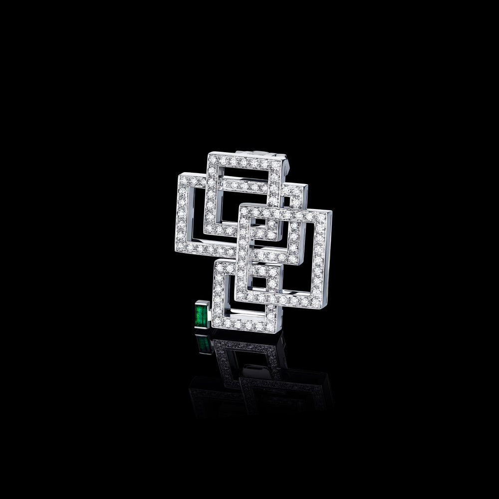 Geometric diamond and Zambian green emerald brooch by Stefano Canturi
