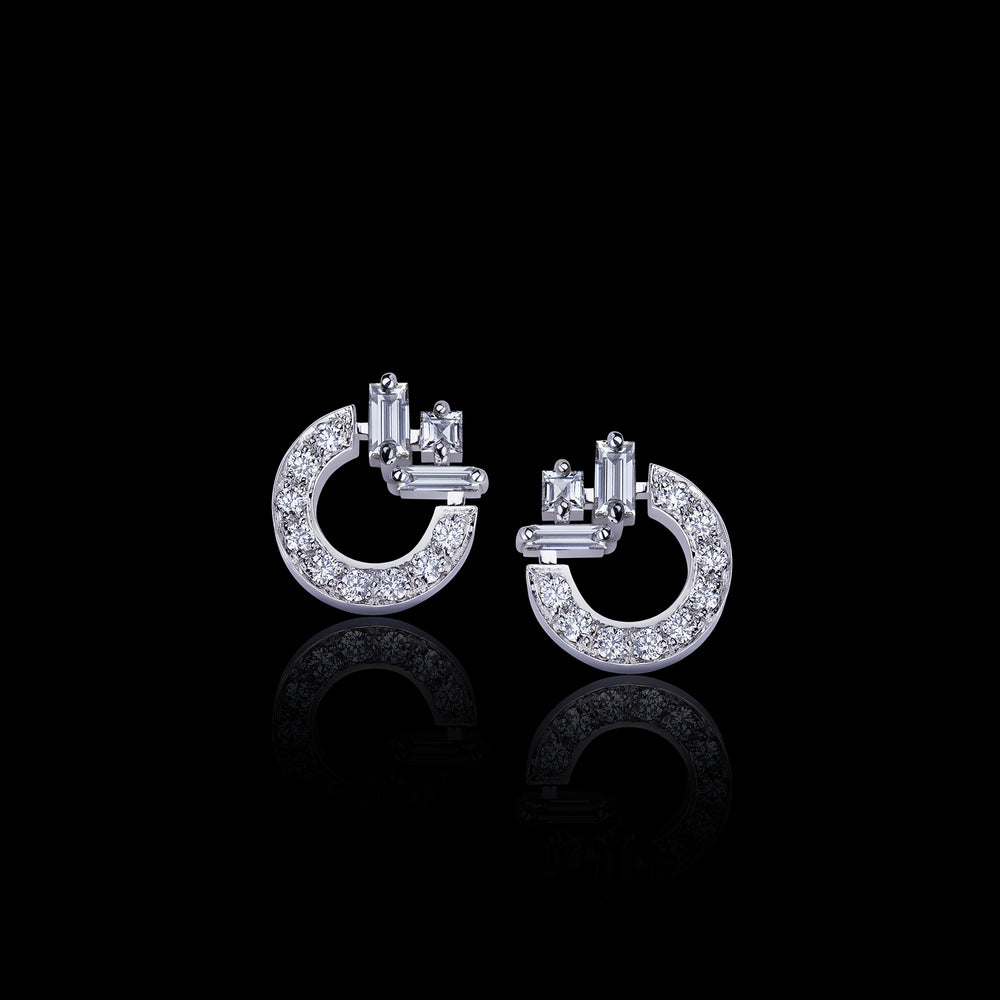 Cubism circular diamond stud earrings featuring baguette, carré and round brilliant cut diamonds in 18ct white gold by Stefano Canturi. 