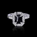 Regina diamond halo ring with emerald cut Australian black sapphire set in 18ct white gold by Stefano Canturi

