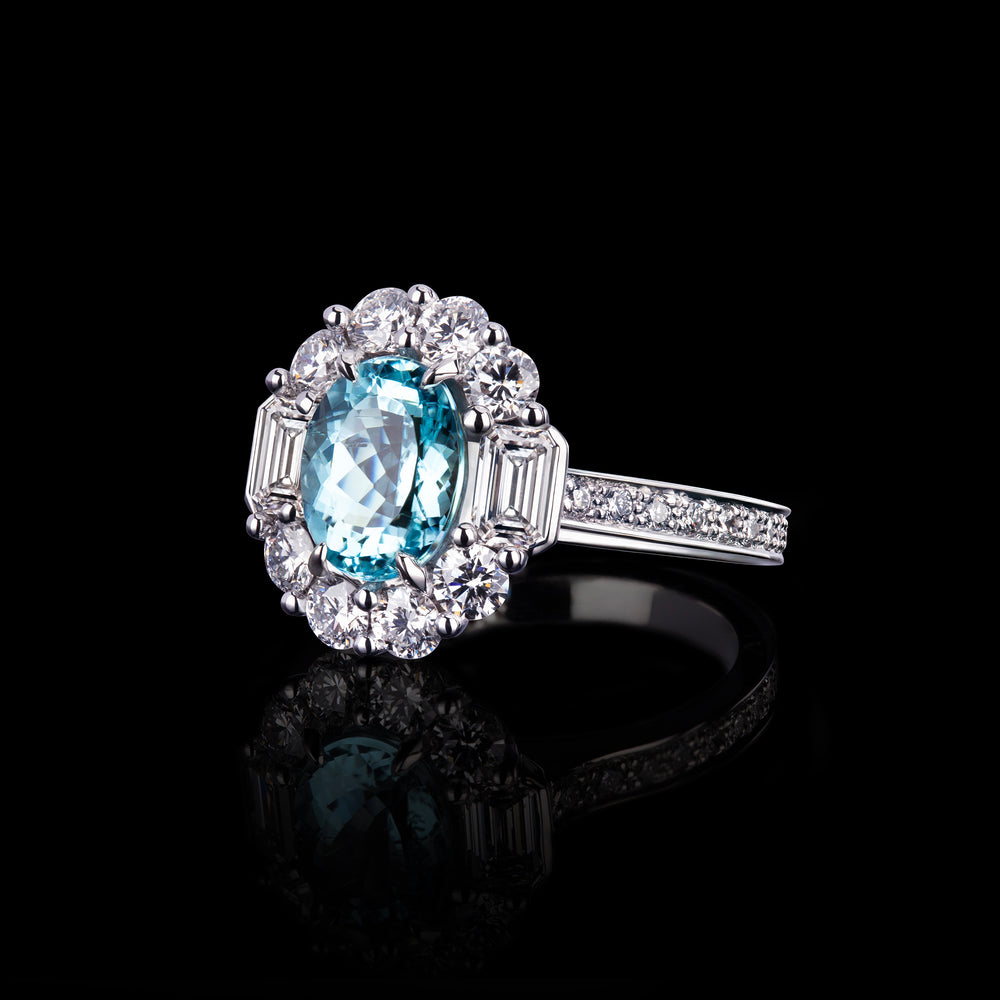 Renaissance round and emerald cut halo ring featuring an Oval Paraiba tourmaline set in 18ct white gold by Stefano Canturi
