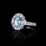Renaissance round and emerald cut halo ring featuring an Oval Paraiba tourmaline set in 18ct white gold by Stefano Canturi