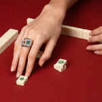 Affinity 3 Link Diamond and Green Emerald Ring in white gold by Stefano Canturi