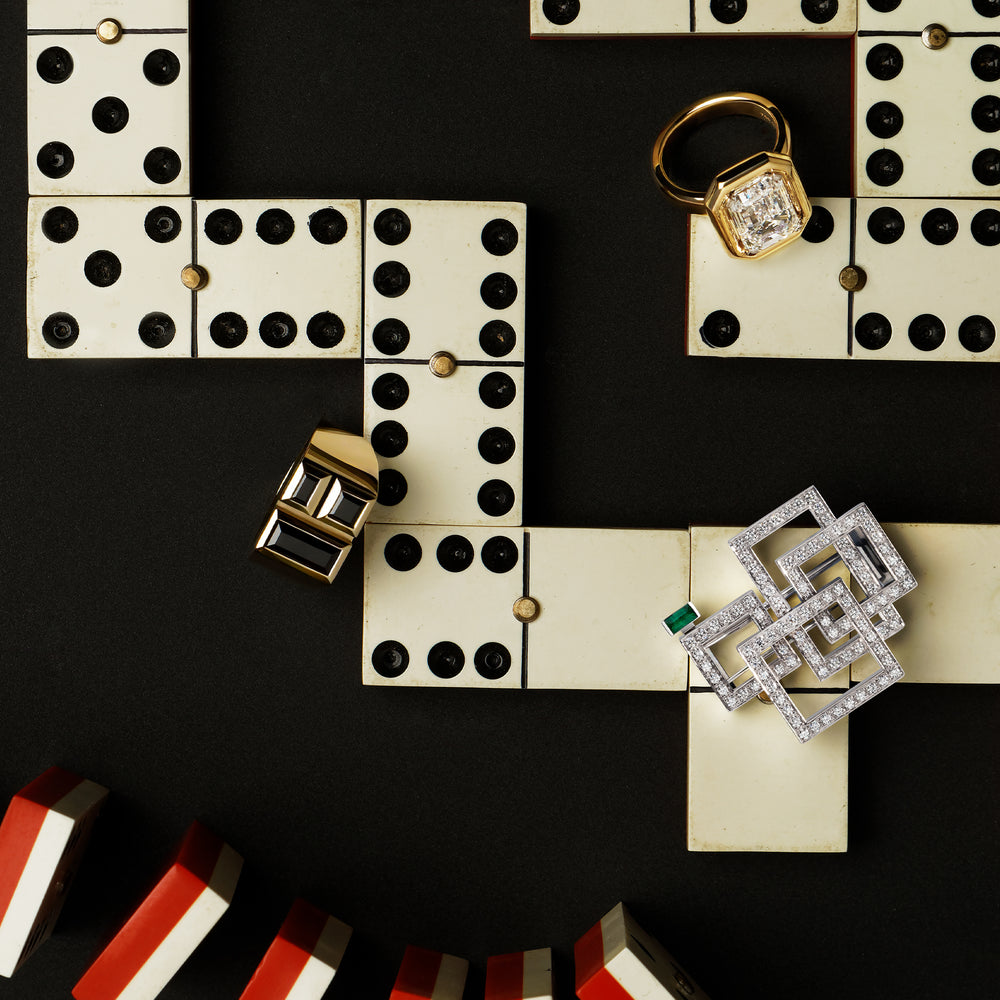 Cubism Signet black spinel ring in 18ct yellow gold Athena 3.01ct emerald cut diamond ring set in yellow gold and Geometric diamond and Zambian emerald brooch in white gold by Stefano Canturi