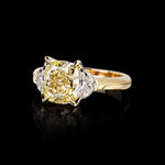 Trilogy 3.02ct Fancy Yellow cushion cut diamond ring with half moon cut diamonds in yellow gold by Stefano Canturi
