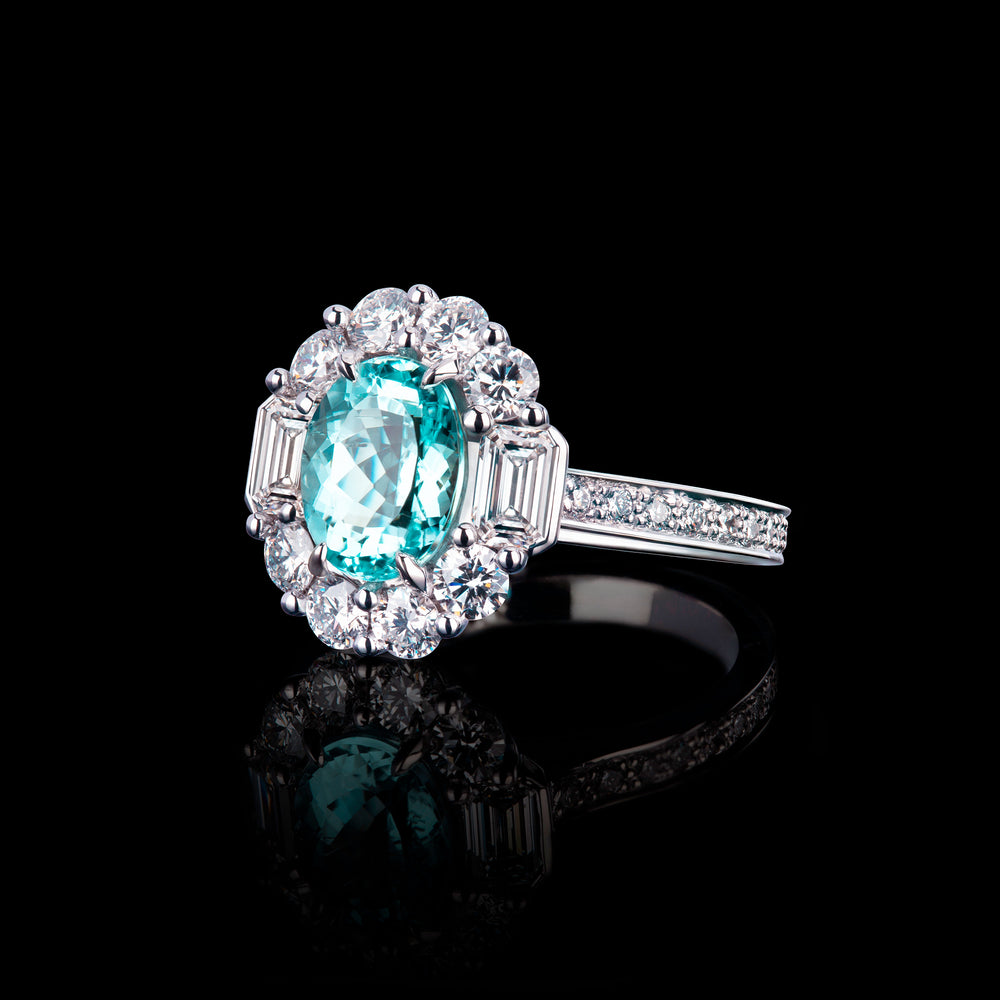 Renaissance round and emerald cut halo ring featuring an Oval Paraiba tourmaline set in 18ct white gold by Stefano Canturi