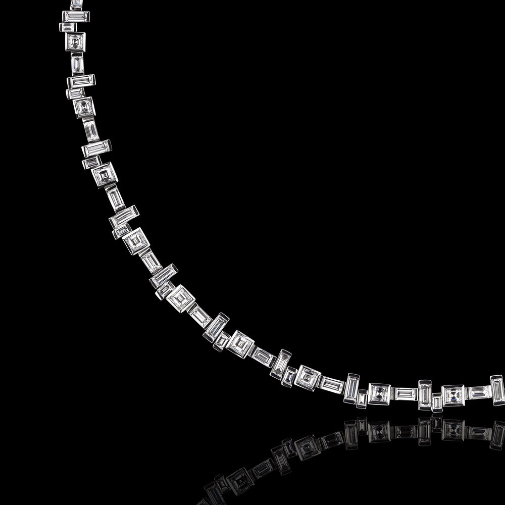 Cubism Radiant diamond Line necklace set in 18ct white gold with Ceylon blue sapphire in the clasp by Stefano Canturi.