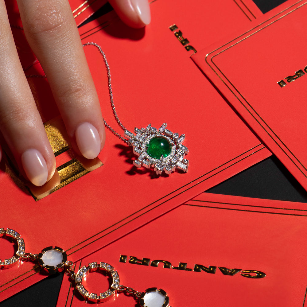 Stella diamond and Zambian green emerald necklace set in 18ct white gold