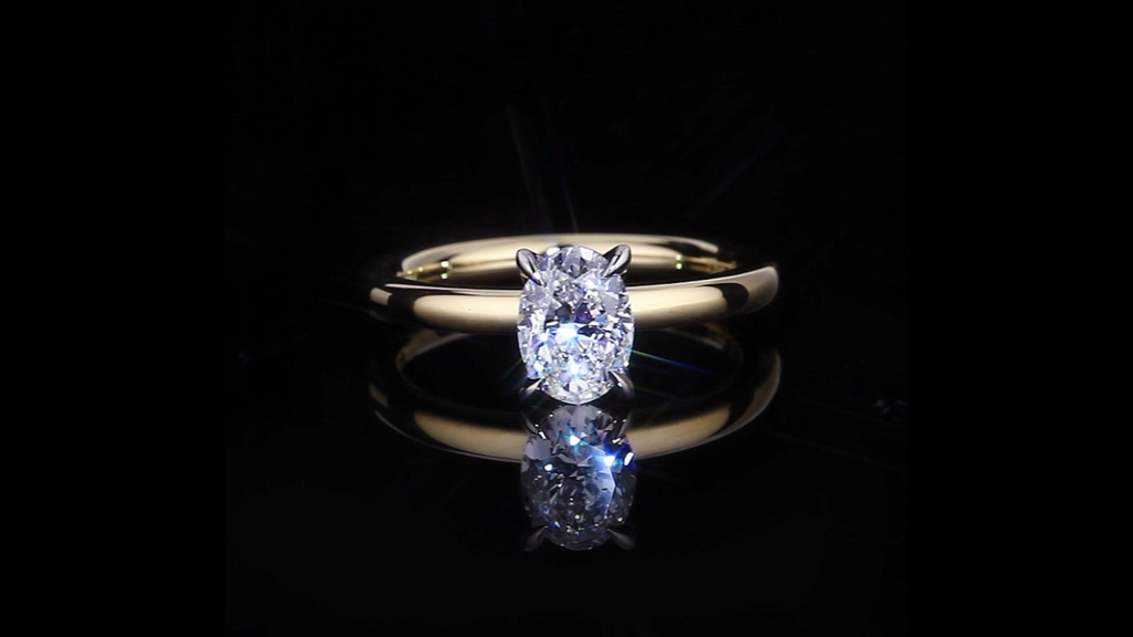 Micro 1.17ct Oval shape diamond engagement ring in 18ct white and yellow gold by Stefano Canturi