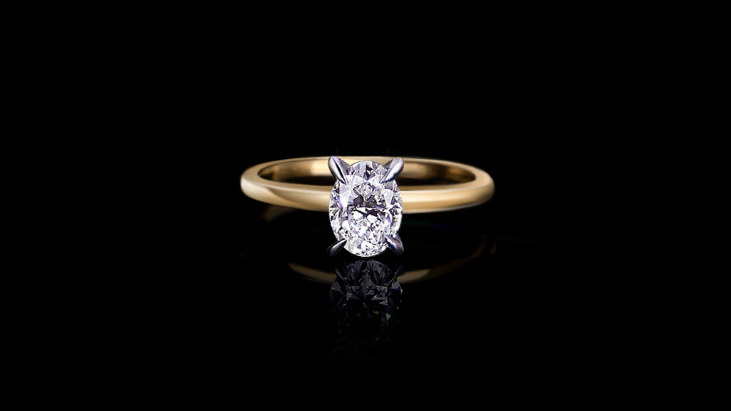 Micro 1.17ct Oval shape diamond engagement ring in 18ct white and yellow gold by Stefano Canturi