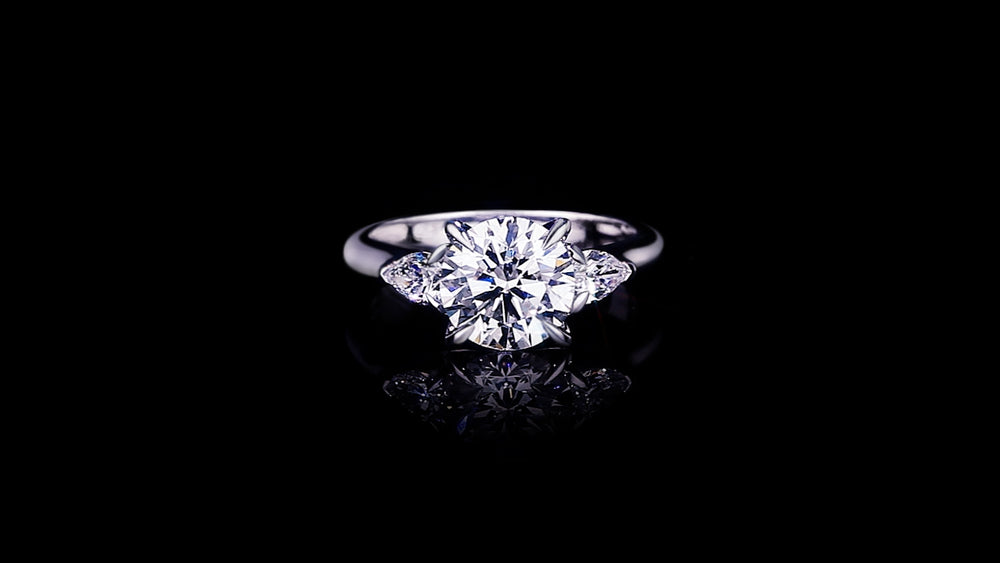 Trilogy 2.50ct Round diamond engagement ring with Pear shape diamonds set in 18ct white gold by Stefano Canturi
