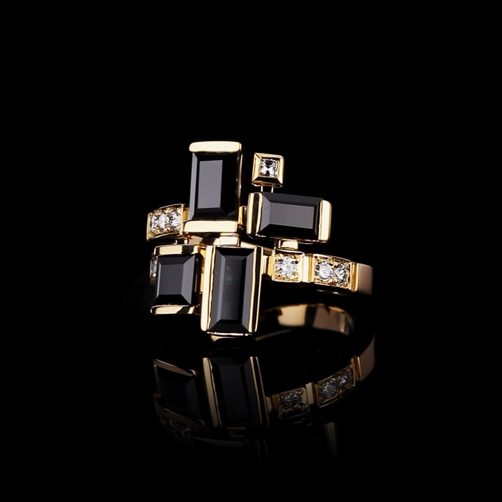 Cubism Australian black sapphire and diamond ing set in yellow gold by Stefano Canturi