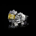 Cubism Radiant domed diamond ring featuring emerald cut fancy intense yellow diamond by Stefano Canturi