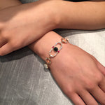 Regina diamond, ruby, Australian black sapphire, moonstone bracelet in 18ct pink gold by Stefano Canturi