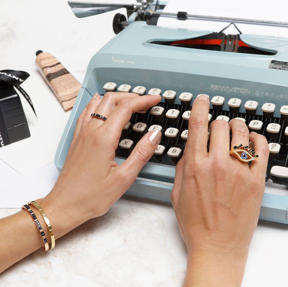 Cubism Eye ring set in 18ct yellow gold with Australian black sapphires, diamonds, spinel gemstones by Stefano Canturi.