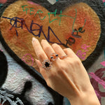 Stella and Regina diamond and Australian black sapphire rings by Stefano Cantur