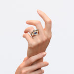 Cubism Eye ring set in 18ct yellow gold with Australian black sapphires, diamonds, spinel gemstones by Stefano Canturi.