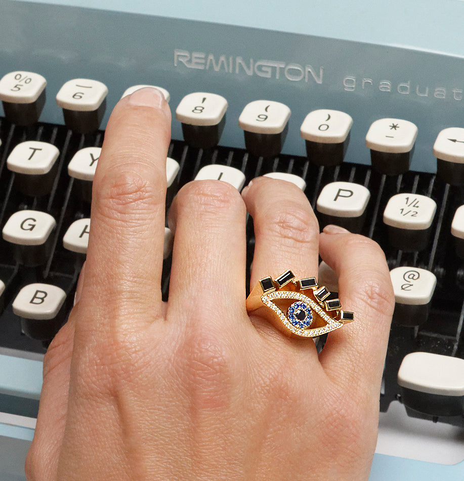 Cubism Eye ring set in 18ct yellow gold with Australian black sapphires, diamonds, spinel gemstones by Stefano Canturi.
