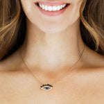 Cubism Eye pendant necklace set in 18ct yellow gold with Australian black sapphires, diamonds, spinel gemstones by Stefano Canturi.