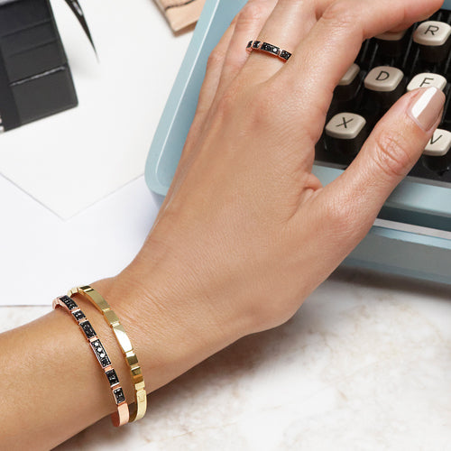 Eternal Mini bangles and Regina black diamond ring by Stefano Canturi